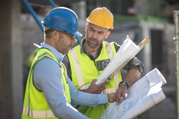 Builders reading plans